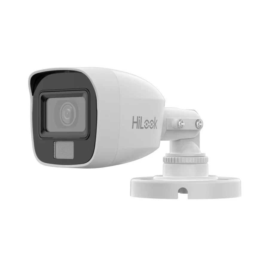 White security camera with black lens on a white background